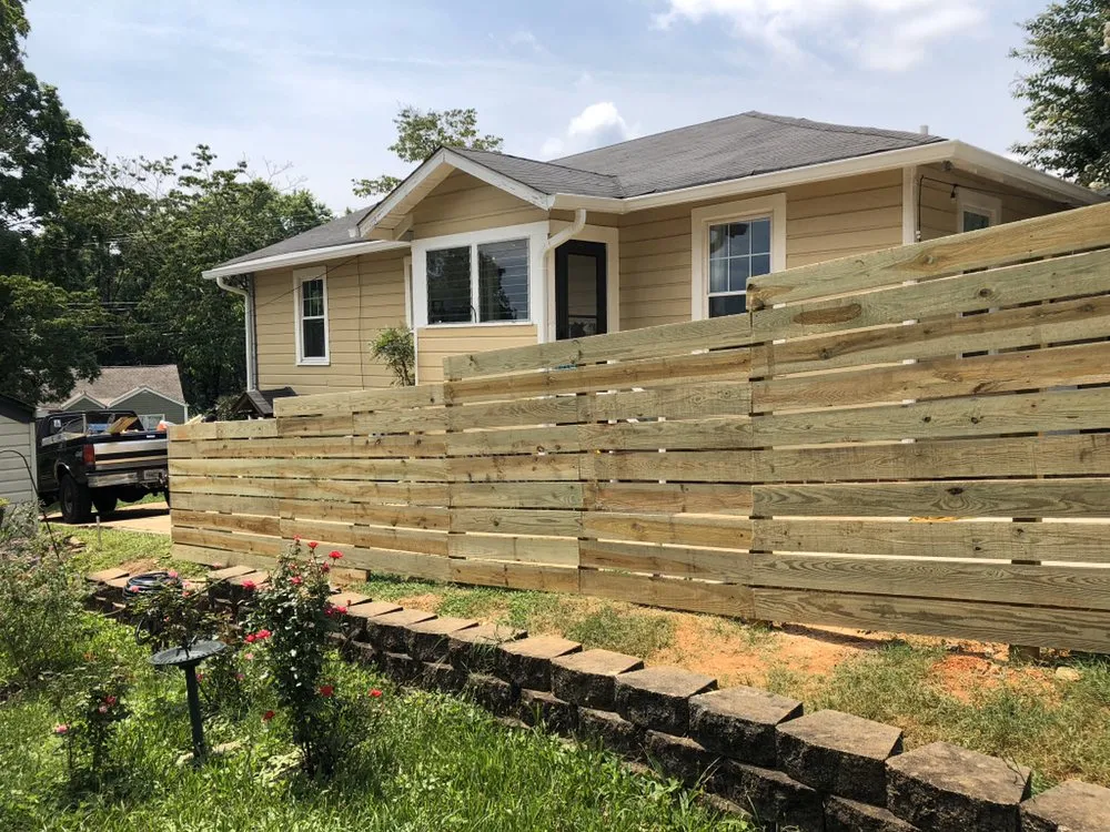 Expert yard cleanup service for residential properties in Kennesaw, GA by Amazing Fences & Landscapes