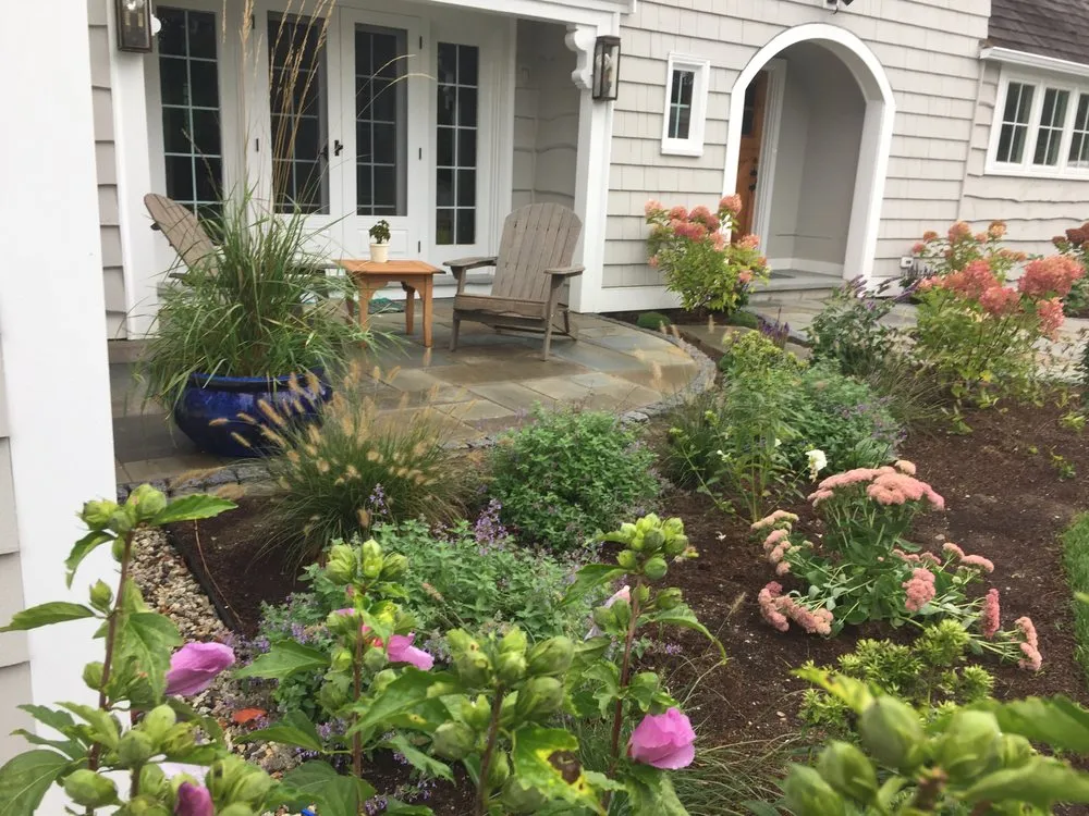 Professional lawn care service for year-round maintenance across Arundel, ME - Ambidextrous