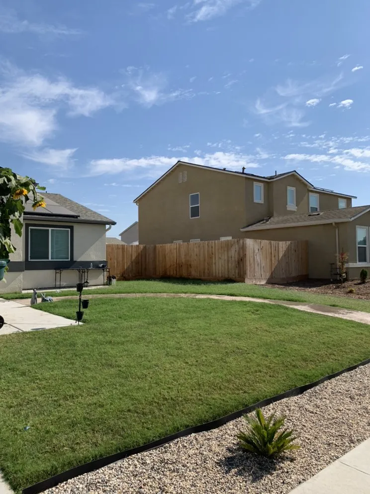 Custom yard maintenance for homes in Tulare, CA by Ambriz Lawn Care