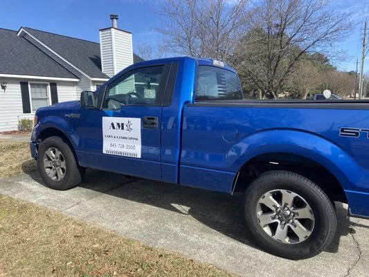 AMC Lawn and Landcsaping Logo