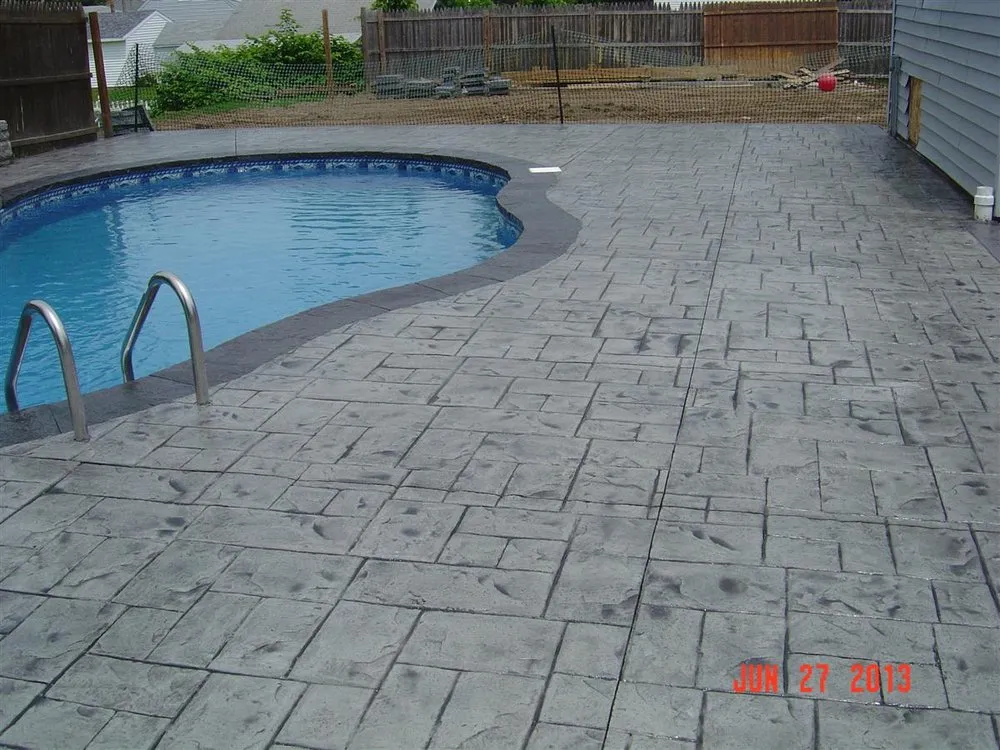 Affordable lawn mowing service for residential properties in Albany, NY by American Design & Contracting