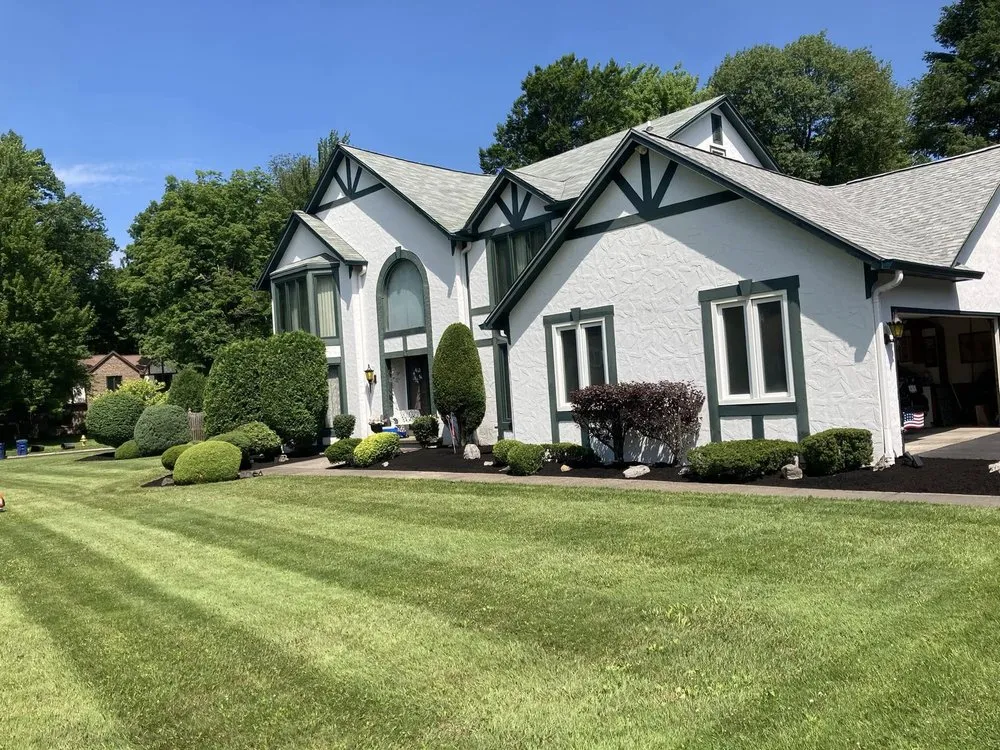 Custom lawn mowing service for year-round maintenance across Buffalo, NY - American Designer Landscape Reserve