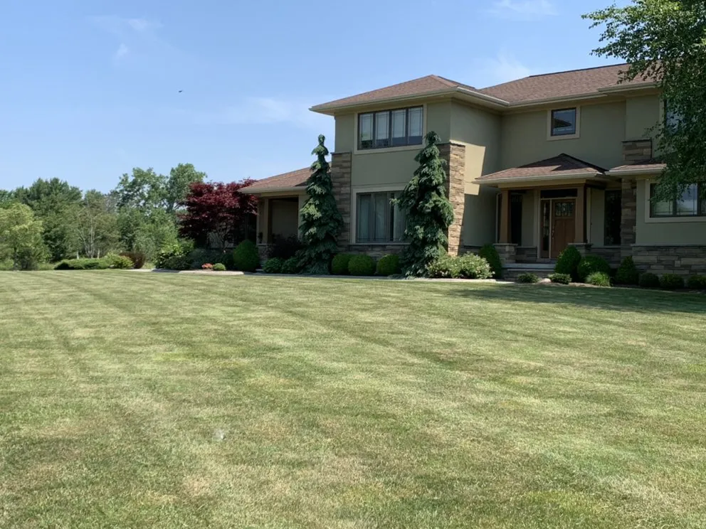 Trusted landscape design with custom design in Elma, NY by American Landscaping & Snowplowing