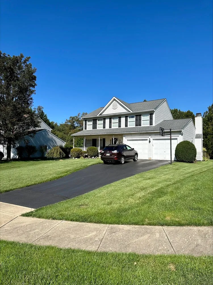 Affordable yard maintenance for year-round maintenance in Sykesville, MD by American Lawn and Tree Specialists