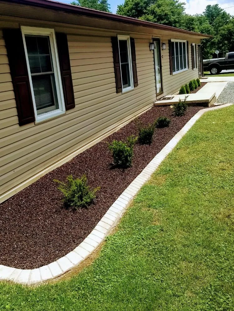 Professional yard cleanup service for outdoor upgrades in Charlotte, NC by American Modern