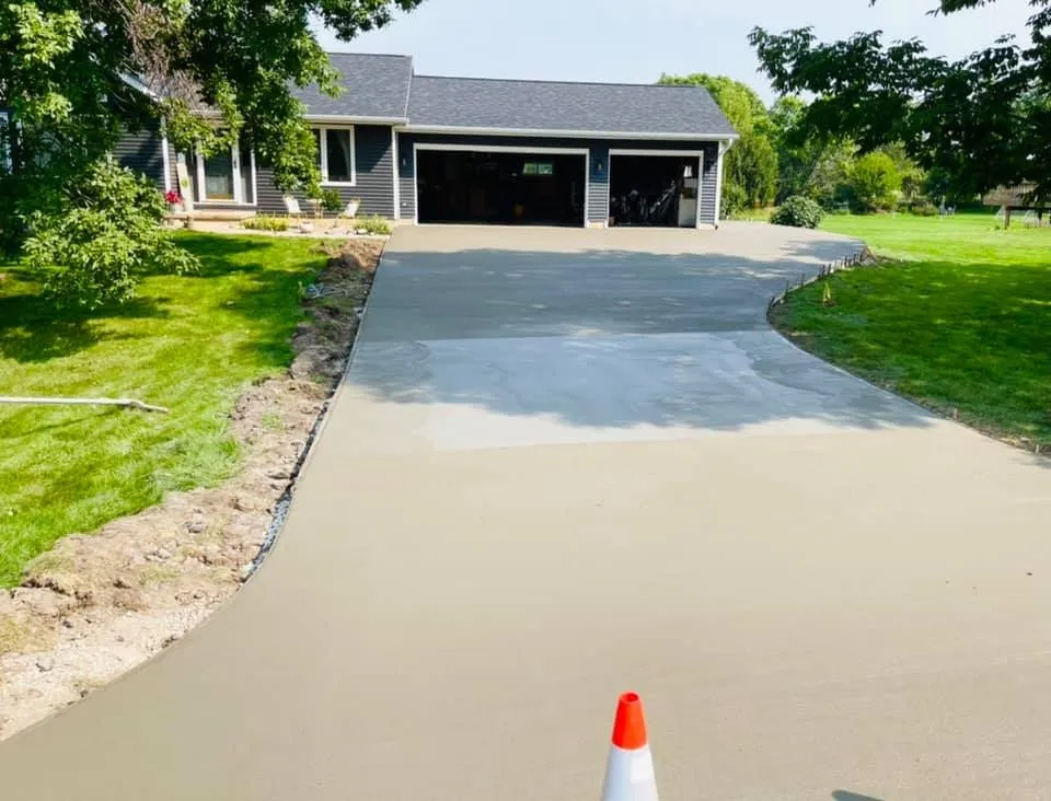 Professional landscape design for residential properties in Homestead, IA by American Outdoor Services