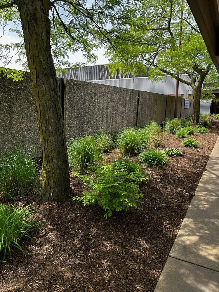 Custom lawn mowing service for residential properties across Peoria, IL - American Outdoor Services