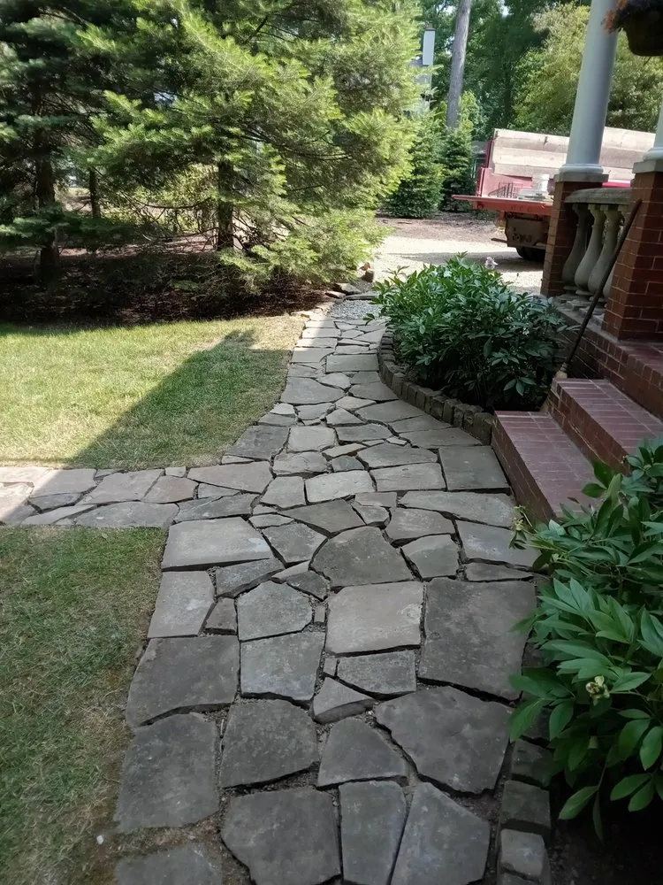 Custom lawn care service for residential properties across Oakmont, PA - American Outdoors
