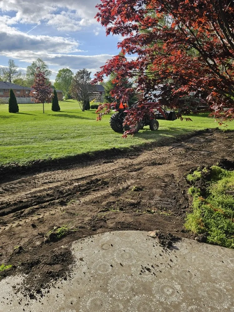 Affordable landscaping services for year-round maintenance in Arenzville, IL by American Pride Tractor Services & Power Washing