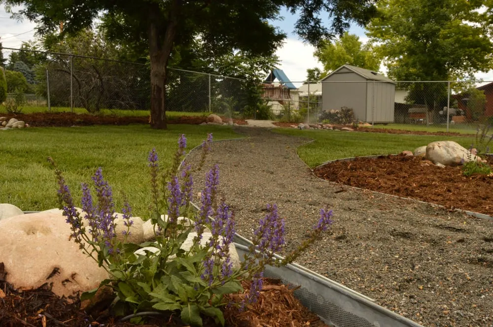 Affordable landscape design with custom design in Littleton, CO by American Sprinkler & Landscape