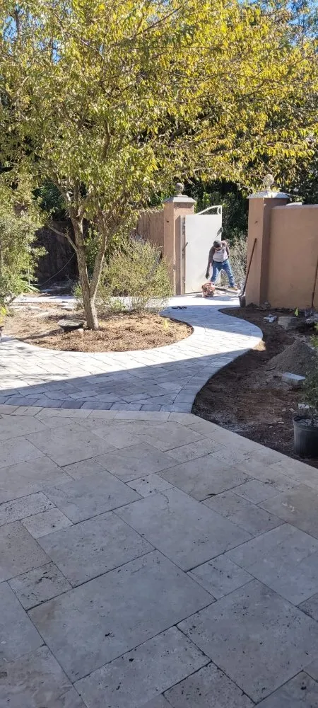 Custom yard cleanup service with custom design in Pensacola, FL by American Tile and Hardscape