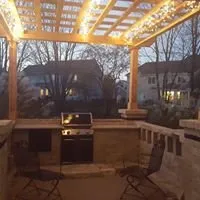 Custom outdoor landscaping for residential properties in Elburn, IL by American Tree and Turf