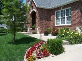 Custom lawn mowing service for residential properties in Elburn, IL by American Tree and Turf