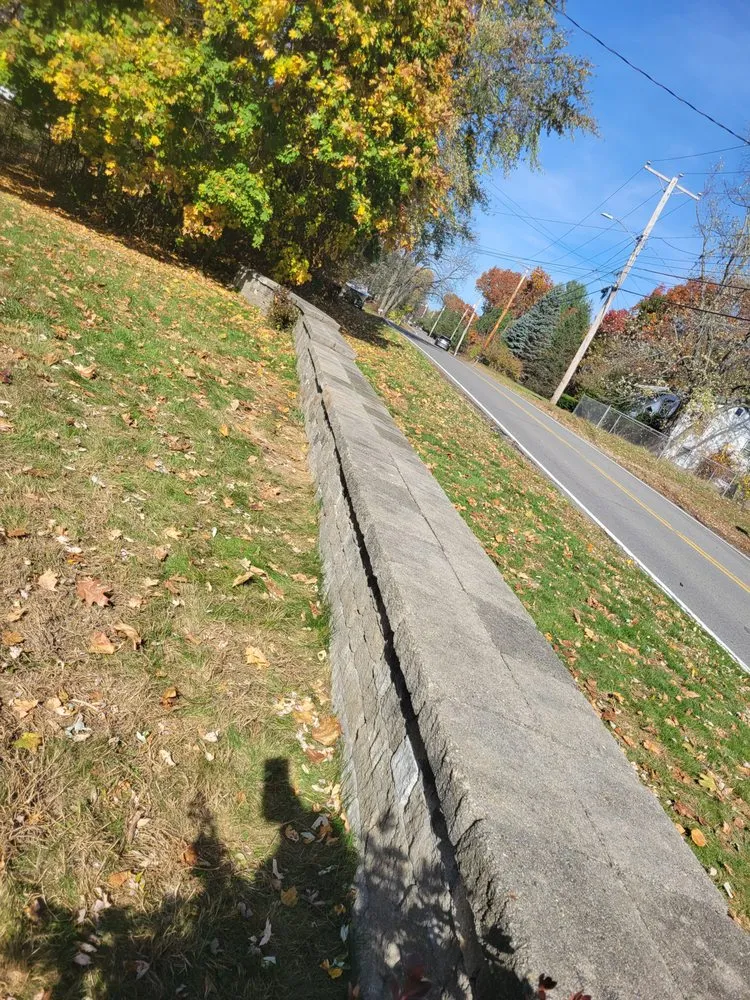 Professional outdoor landscaping experts serving Hudson, NH - American Wall and Patio