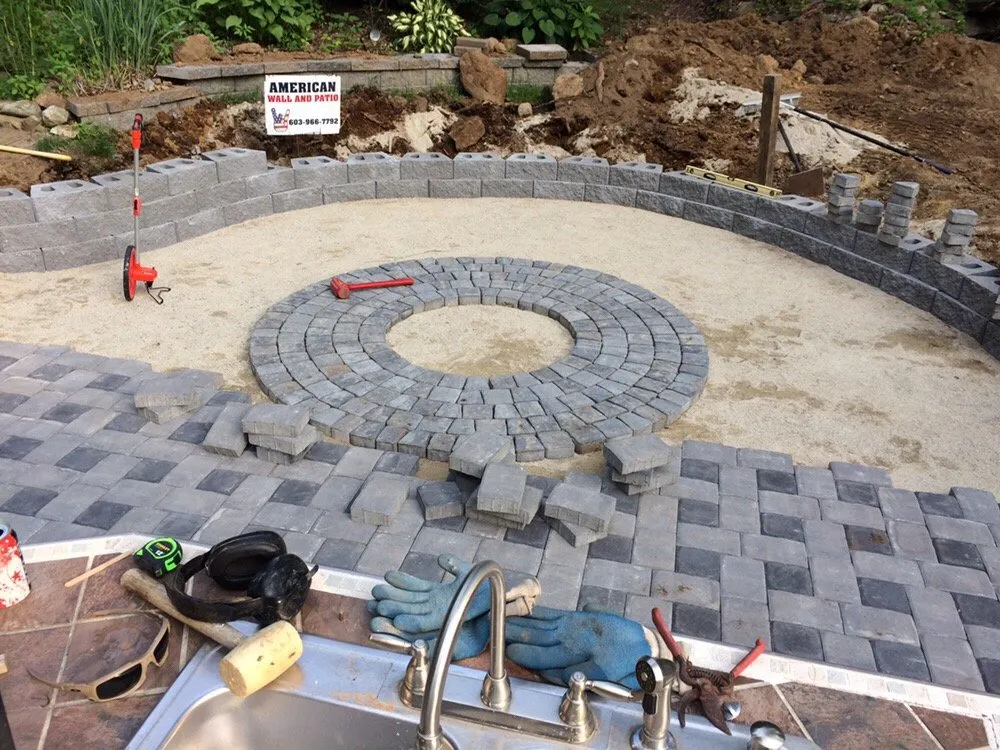 Professional yard maintenance in Hudson, NH by American Wall and Patio