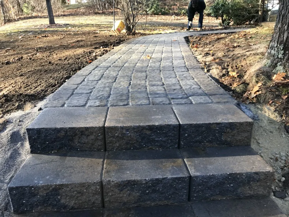 Custom garden landscaping for year-round maintenance across Hudson, NH - American Wall and Patio