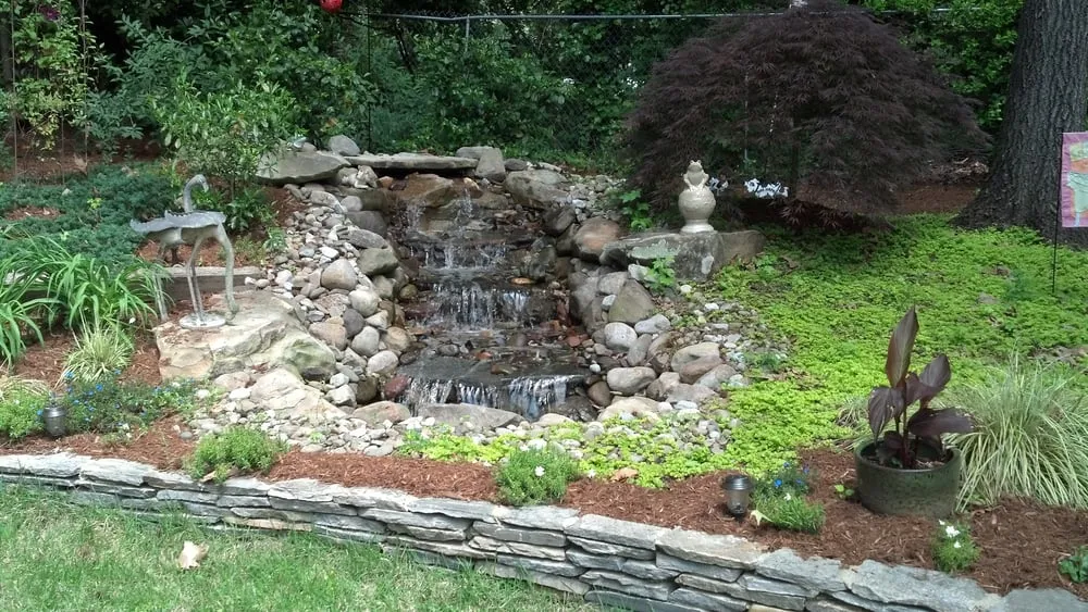 Custom garden landscaping for year-round maintenance in Holly Springs, NC by Ames Landscaping