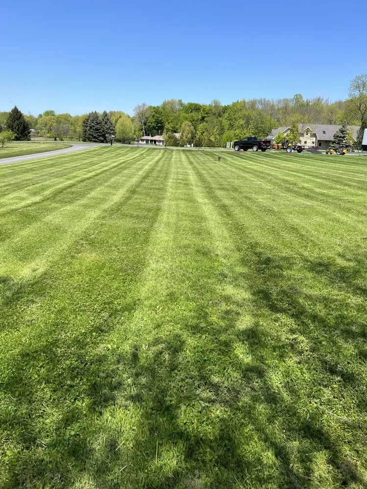 Custom outdoor landscaping for homes in Auburn, NY by AMG Mowing