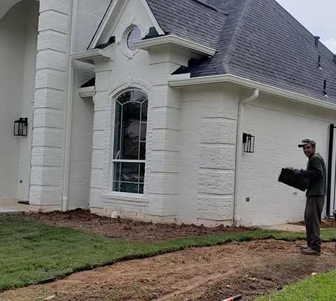 Custom landscape installation with custom design across Houston, TX - Amigos Landscaping