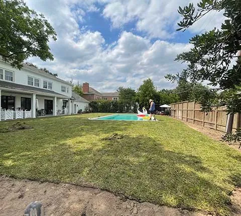 Reliable lawn mowing service with custom design in Houston, TX by Amigos Landscaping