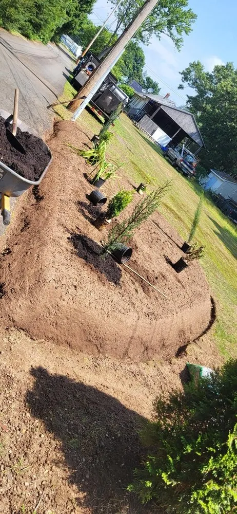 Custom landscape installation for year-round maintenance in New Haven, CT by Amorales Landscaping