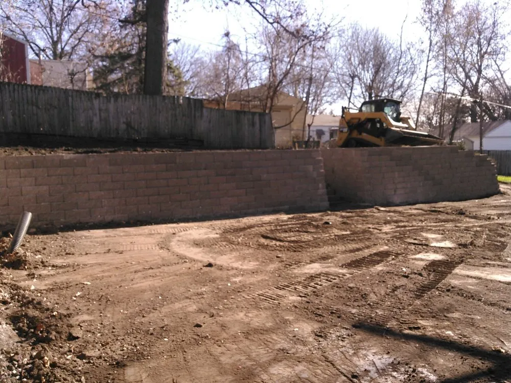 Professional landscape design for year-round maintenance across Urbandale, IA - AMP Construction and Landscaping