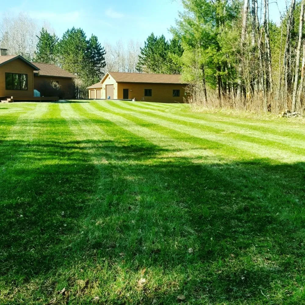 Custom lawn care service for beautiful yards in Waupaca, WI by Anderson Custom Services