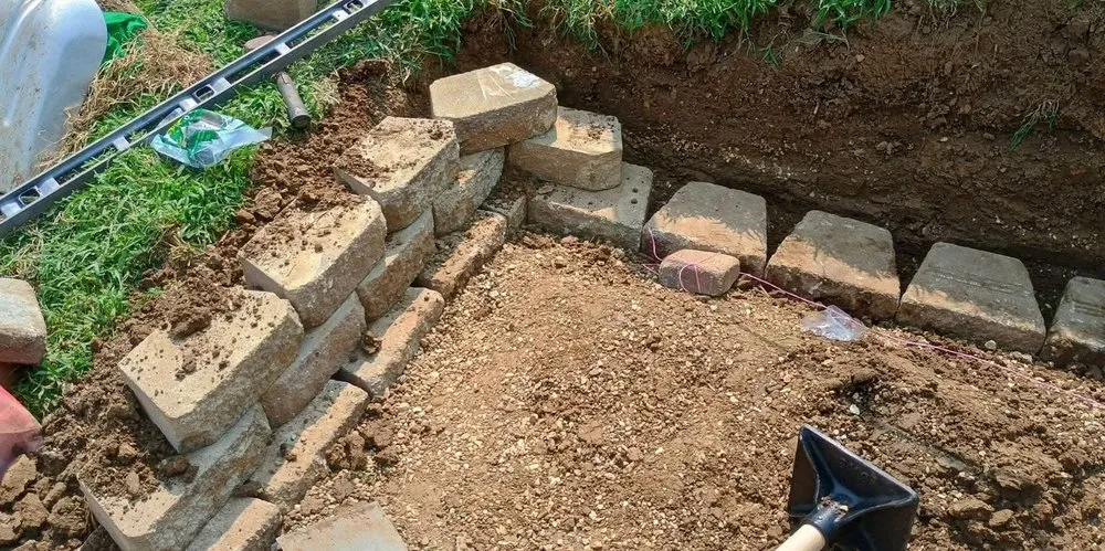 Custom residential landscaping with custom design in Blue Springs, MO by Anderson Tree And Outdoor