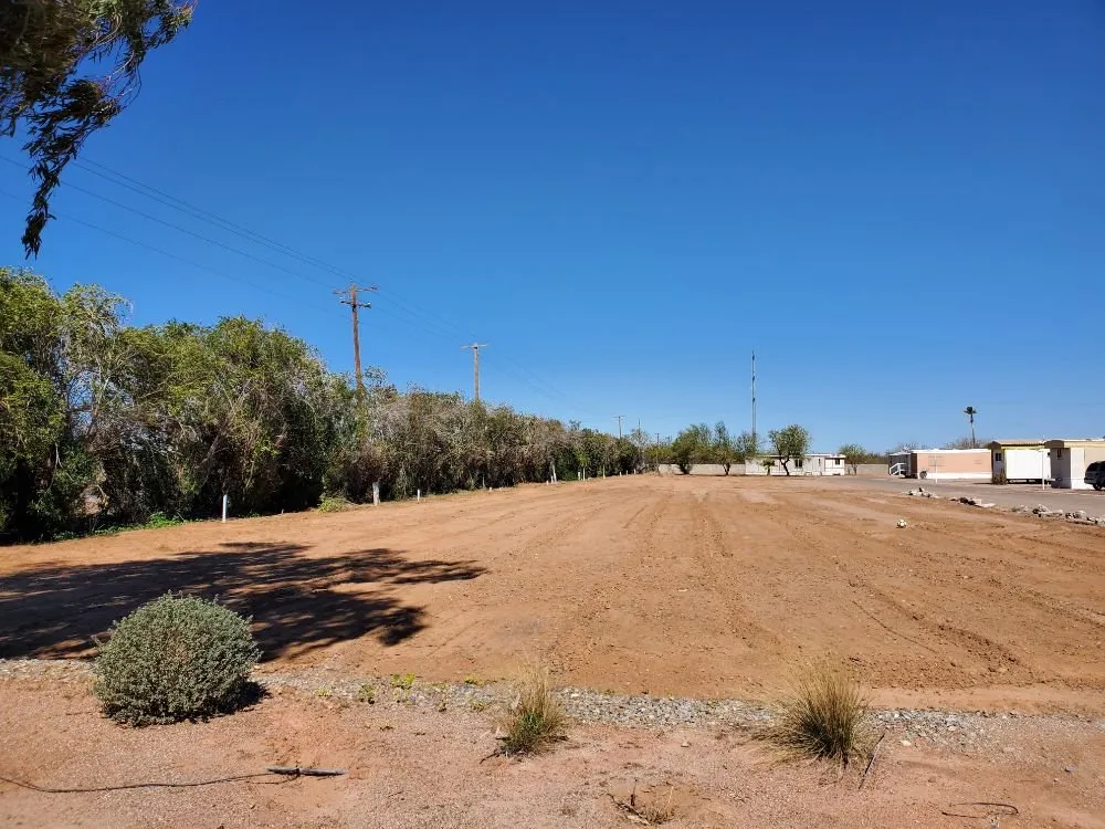 Custom outdoor landscaping for residential properties in Casa Grande, AZ by Andres & Ronita's Empire
