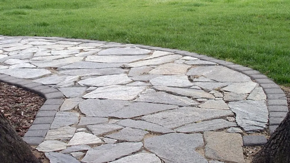 Expert landscape design for beautiful yards in Rochester, MN by Andrews Lawncare & More