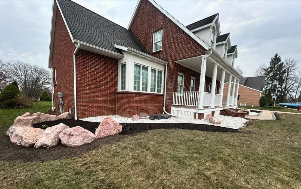 Affordable lawn mowing service for residential properties across Hudsonville, MI - Anes Excavating & Landscaping