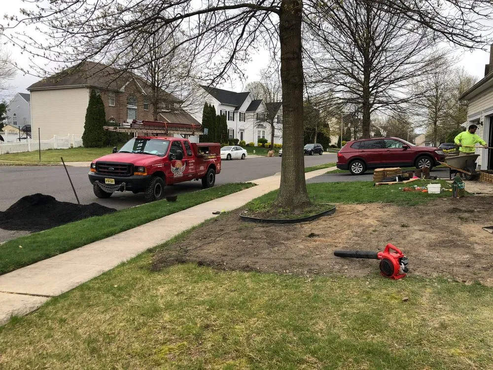 Affordable lawn mowing service for residential properties in Trenton, NJ by Angel General Renovations