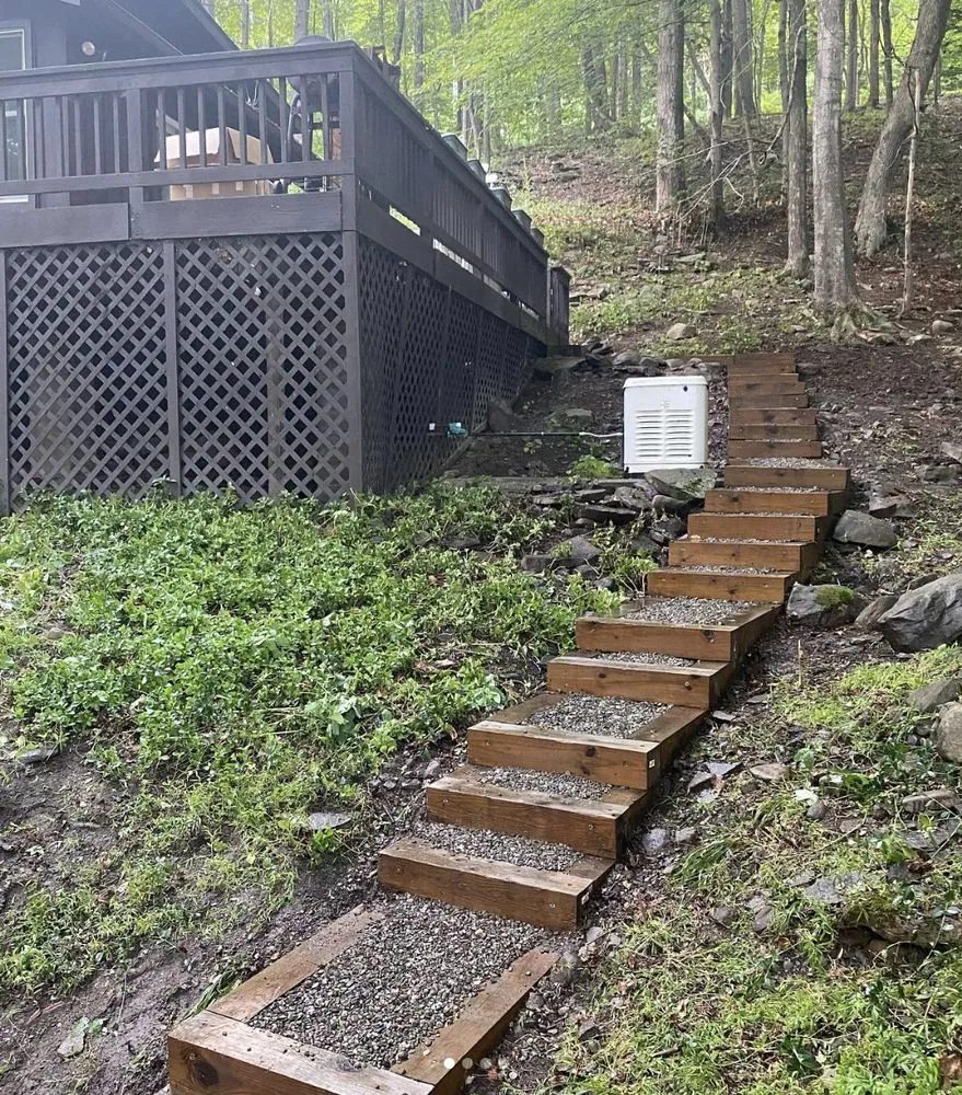 Expert lawn mowing service for residential properties in Woodstock, NY by Angel Landscaping