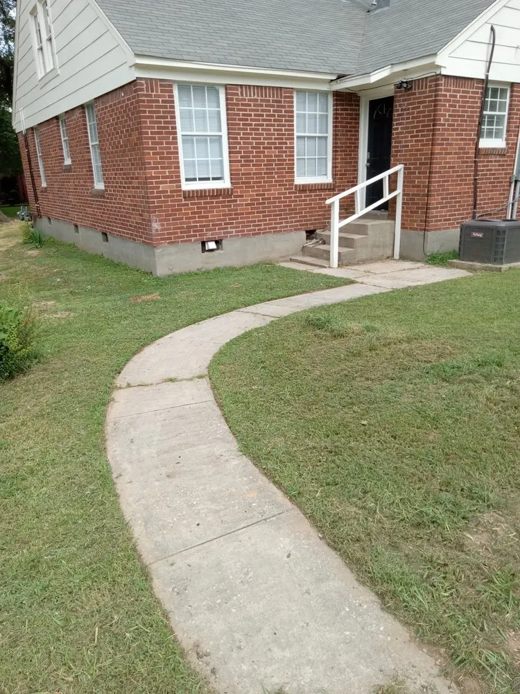 Professional outdoor landscaping with custom design in Byhalia, MS by Angelos Lawn Care & Pressure Washings