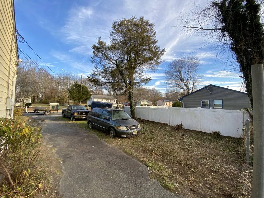 Affordable lawn care service for homes in Millville, NJ by Angels Land Management