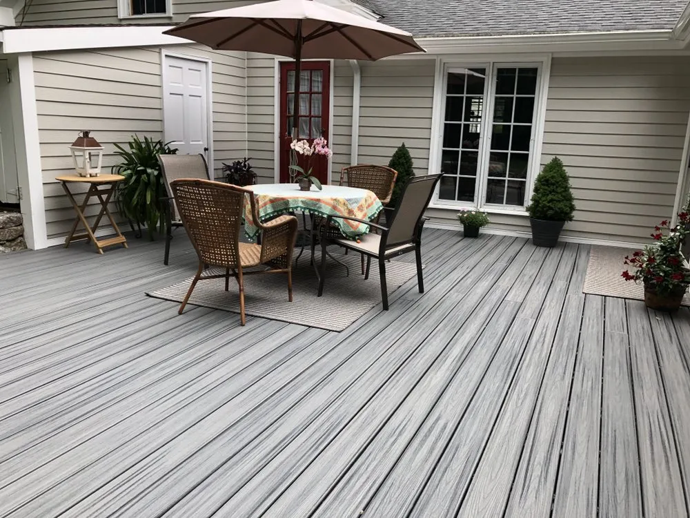 Custom lawn care service for year-round maintenance in Natick, MA by Angel's Landscaping & Design