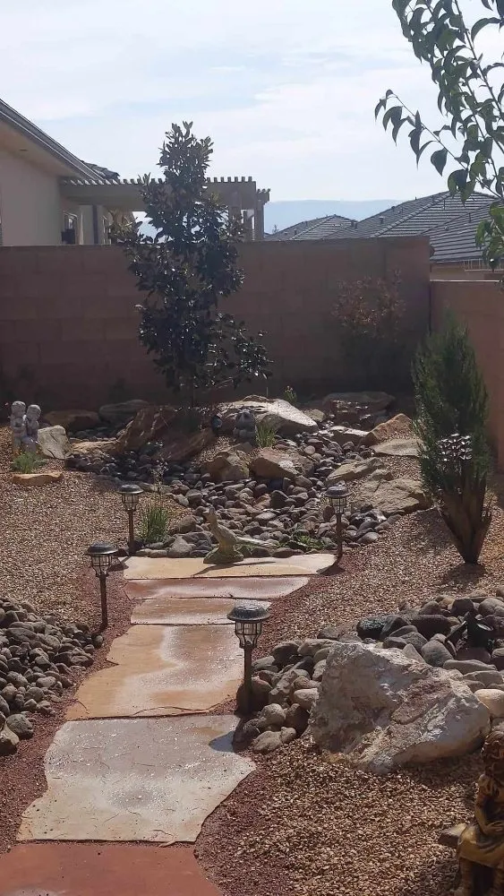 Custom lawn mowing service with custom design in Washington, UT by Angel's Landscaping and Curbing