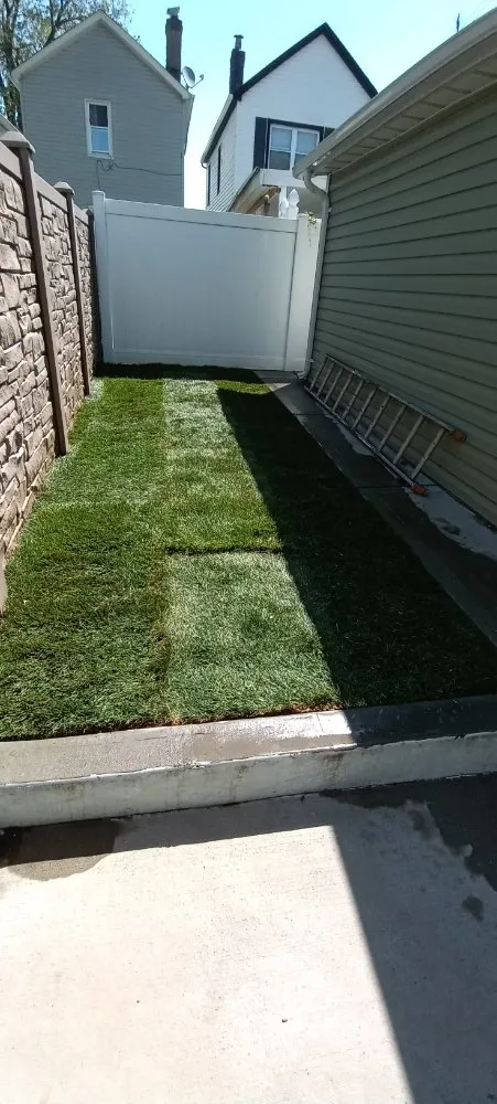 Professional yard maintenance for homes in Flushing, NY by Angel's Landscaping