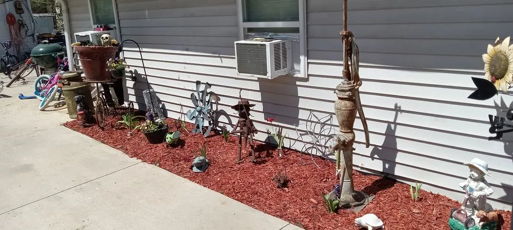 Custom yard cleanup service for year-round maintenance in Beloit, WI by Angown Landscaping