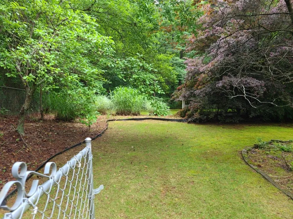 Reliable lawn mowing service for outdoor upgrades in Fayetteville, GA by Anj Exterior Maintenance