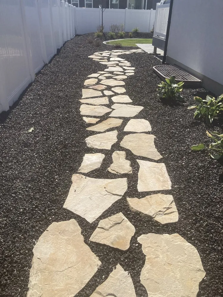 Local yard cleanup service in Clearfield, UT by Ansell’s sprinkler landscape