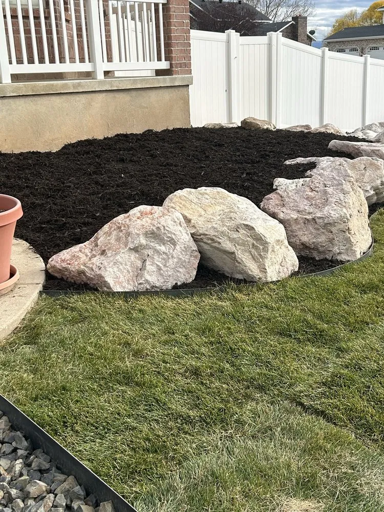 Reliable landscape design with custom design in Clearfield, UT by Ansell’s sprinkler landscape