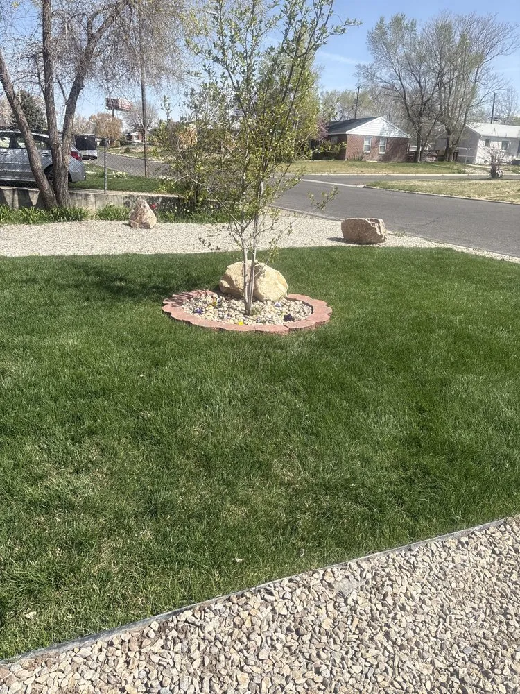 Professional landscape design for homes across Clearfield, UT - Ansell’s sprinkler landscape
