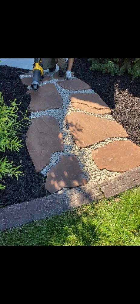 Top-rated outdoor landscaping for homes in Clearfield, UT by Ansell’s sprinkler landscape