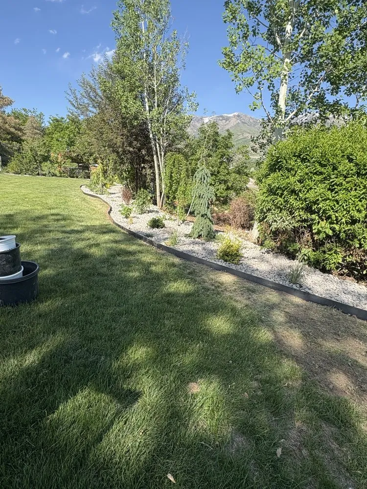 Trusted residential landscaping for year-round maintenance across Clearfield, UT - Ansell’s sprinkler landscape