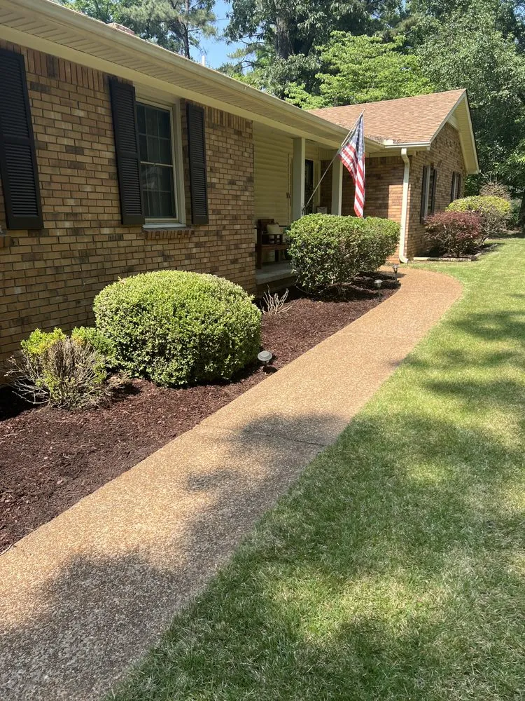 Professional yard cleanup service for residential properties in Covington, TN by Antonio Gaines Lawn Care & Landscape