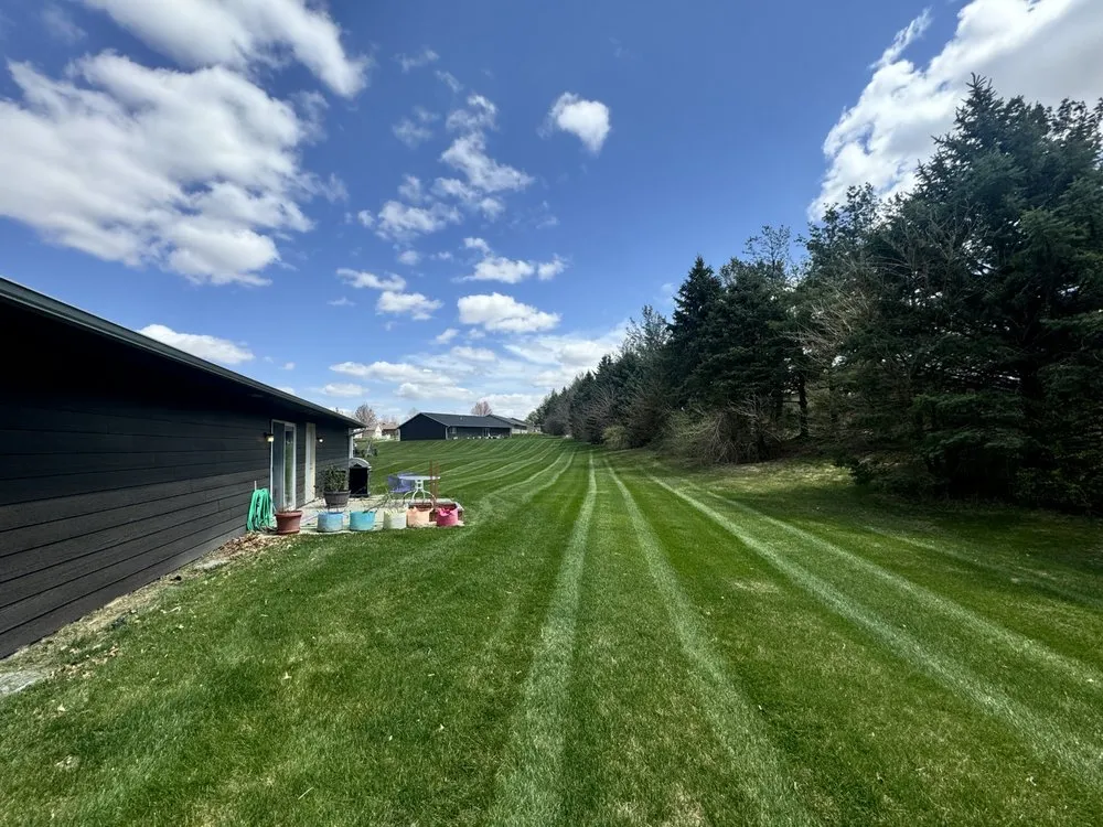 Custom lawn mowing service for residential properties in Urbandale, IA by Antonios mobile detailing