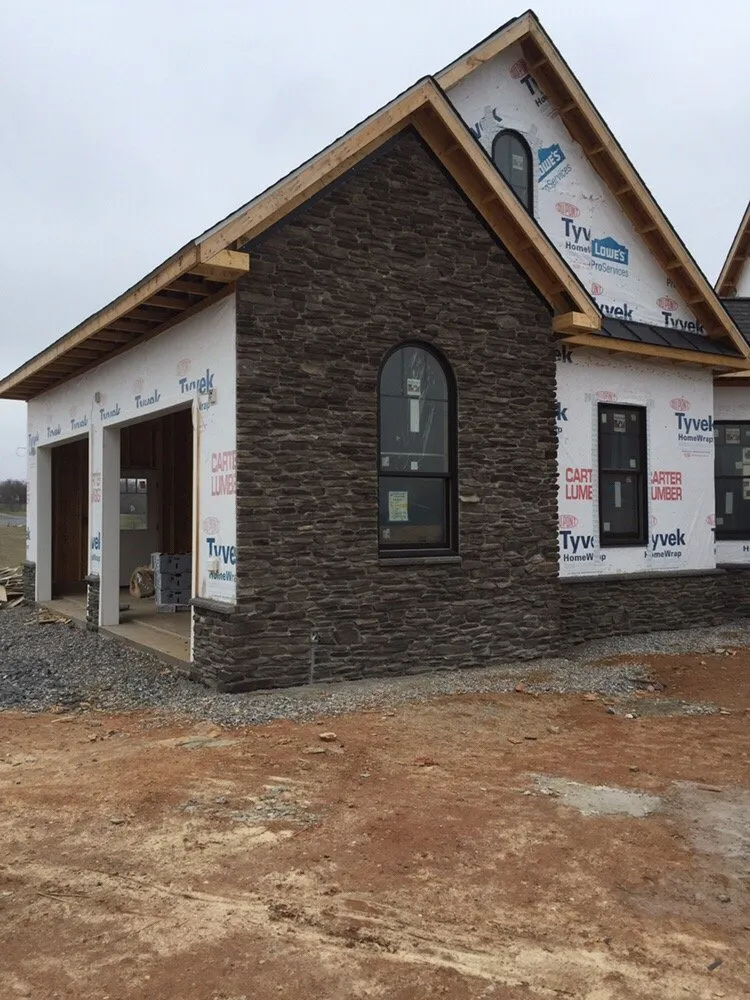 Professional residential landscaping for year-round maintenance in Knoxville, MD by Anvil Masonry