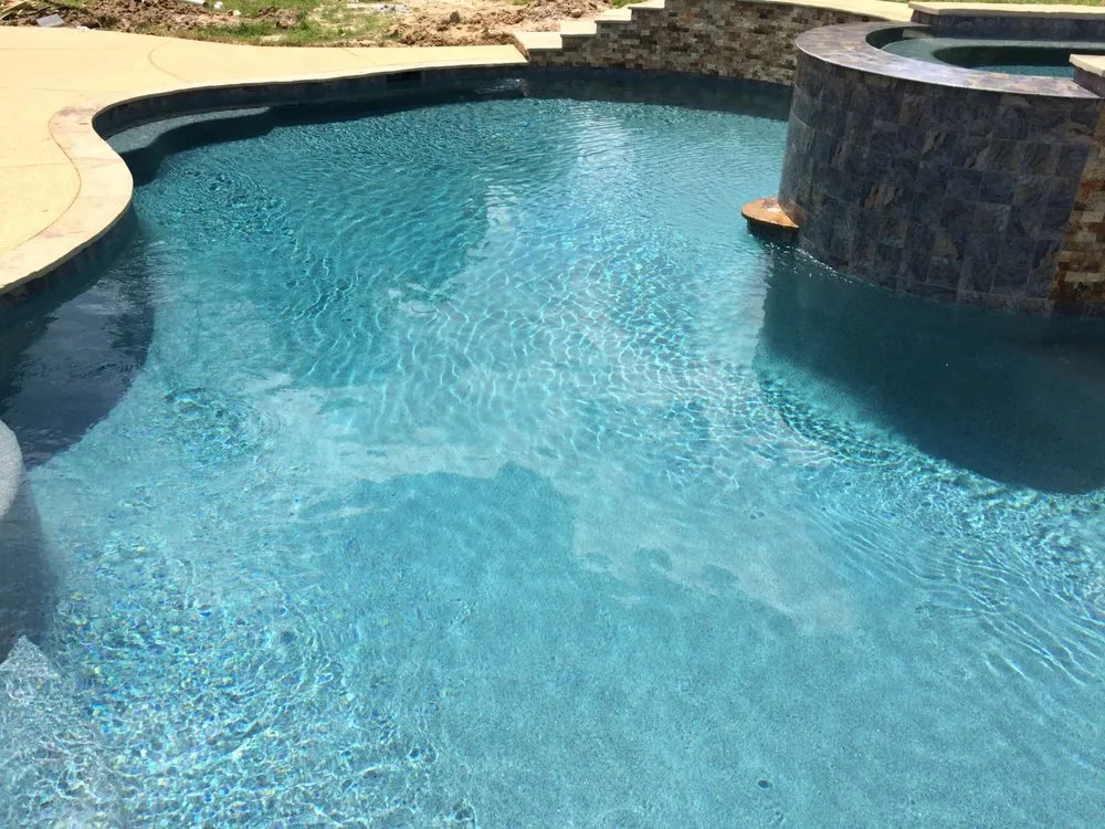 Custom residential landscaping for year-round maintenance across Conroe, TX - AO Platinum Pools