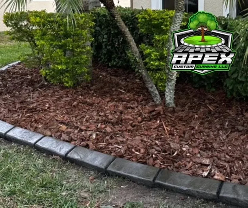 Custom lawn mowing service for outdoor upgrades in Winter Garden, FL by Apex Custom Curbing